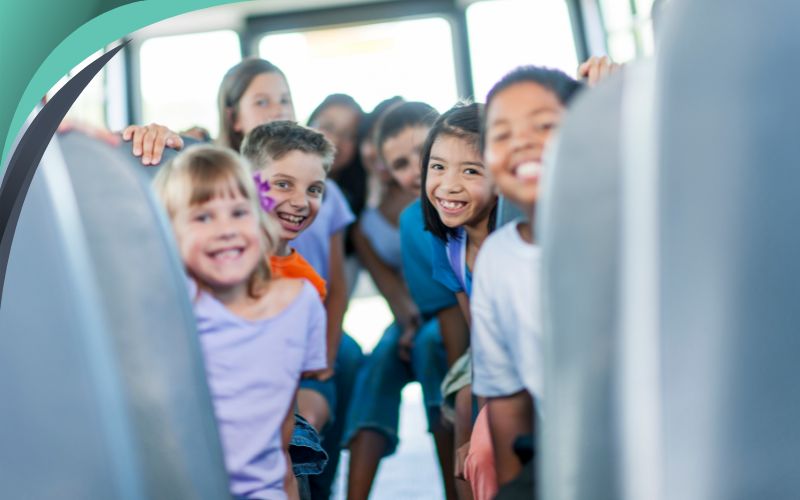 Students happily boarding a comfortable group transport, school field trip, May 2024, Australia.