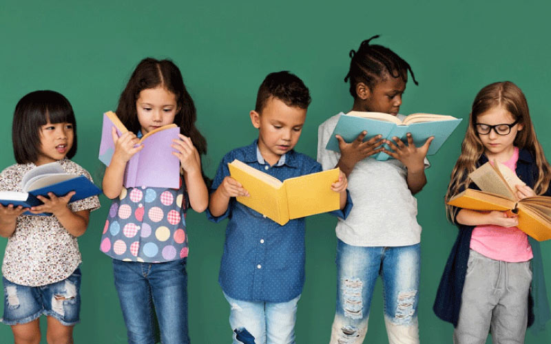 a group of kids reading books, October 2024, Australia