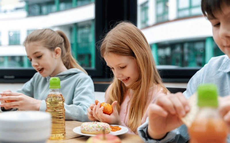 kids enjoying healthy lunch together at the school cafeteria, student safety, November 2024, Australia